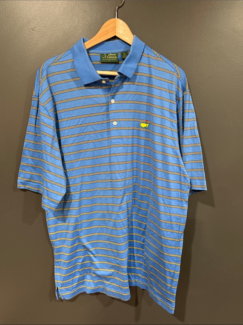 Light Blue Striped Polo with Yellow Chest Emblem